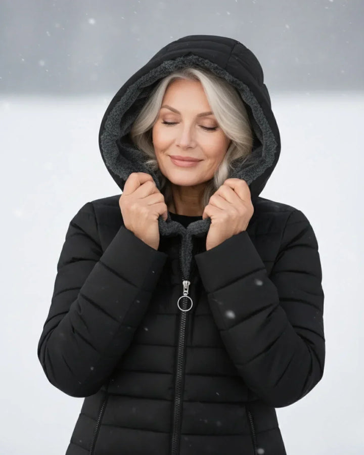 Cappotto invernale trapuntato da donna con cappuccio e fodera in pile