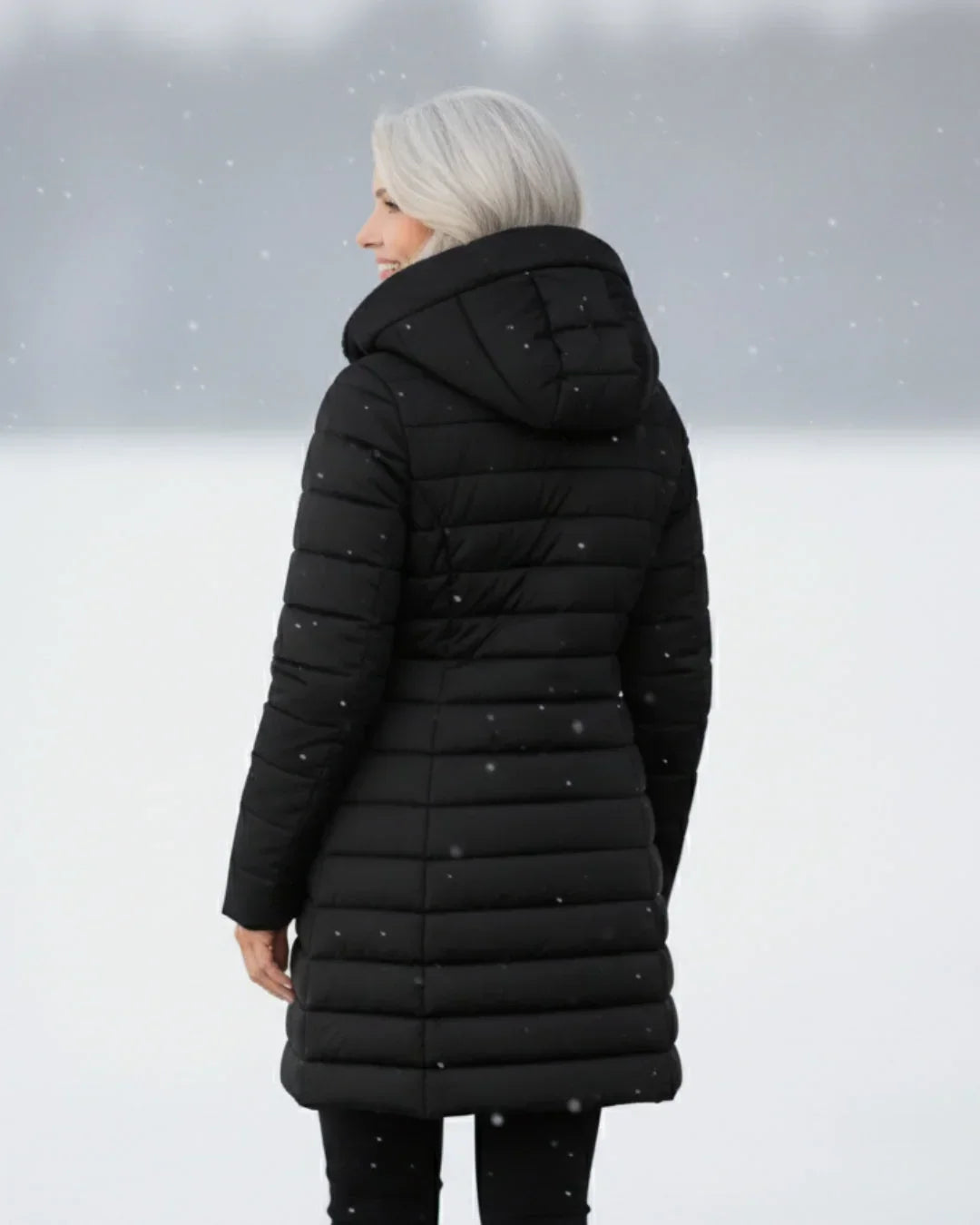 Cappotto invernale trapuntato da donna con cappuccio e fodera in pile