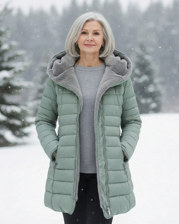Cappotto invernale trapuntato da donna con cappuccio e fodera in pile