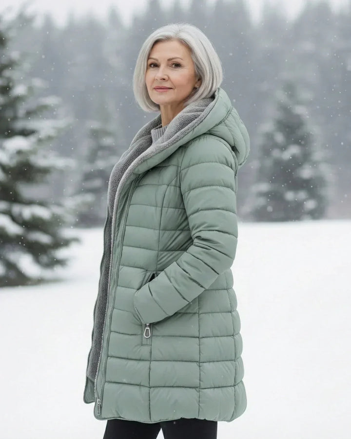 Cappotto invernale trapuntato da donna con cappuccio e fodera in pile